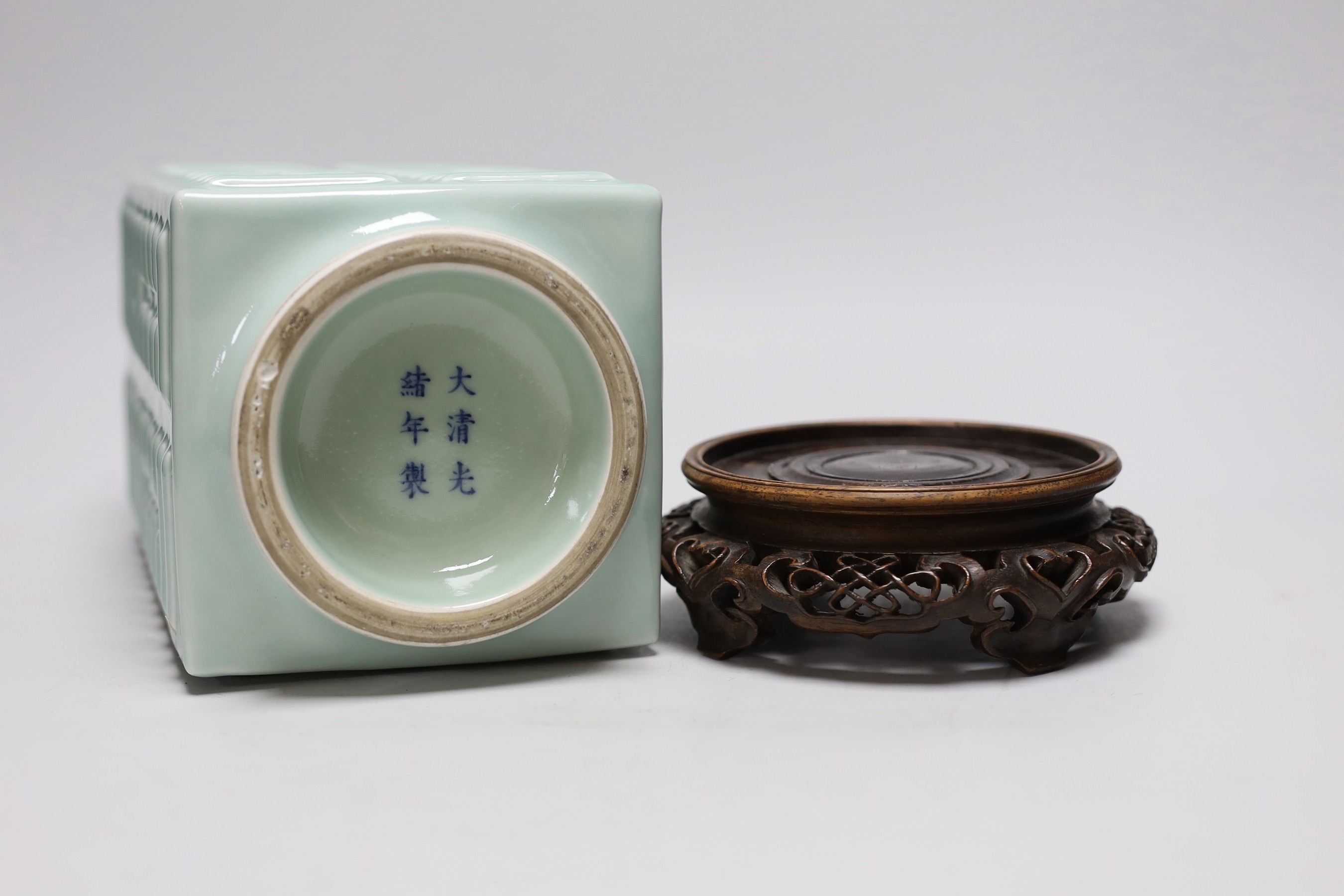 A Chinese celadon glazed eight trigrams cong vase, Guangxu mark, wood stand, 35cms high